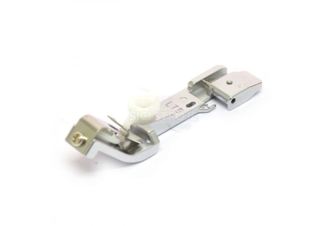 Patka pro všívání gumy pro overlocky Brother X76663001 (SA212)